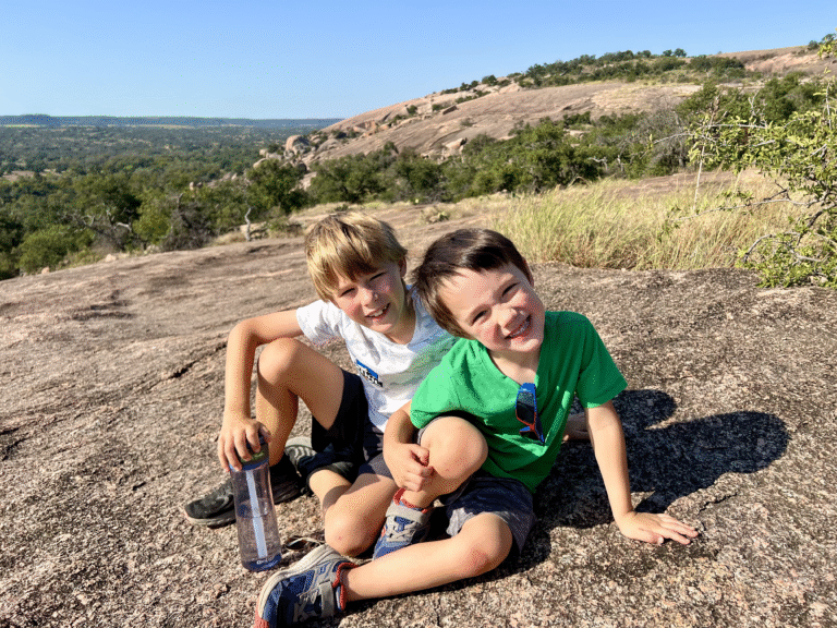 A Local's Guide to charming Fredericksburg, Texas Enchanted Rock_Boys